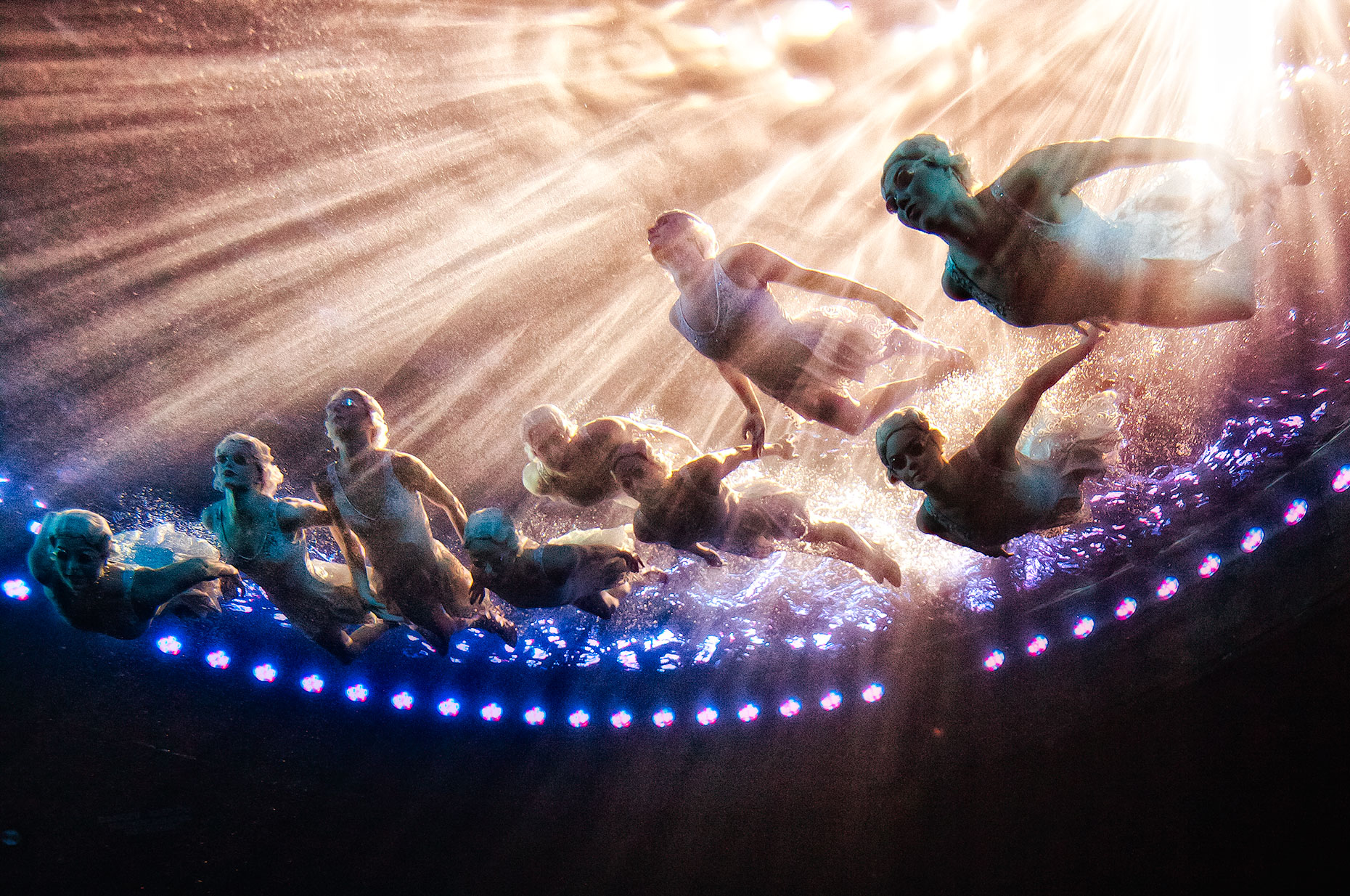 Underwater shot of synchronized swimmers Le RÊVE the Dream show At the Wynn Las Vegas Advertising